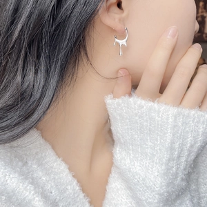 Minimalist S925 sterling silver lava teardrop earrings on a model with polished finish