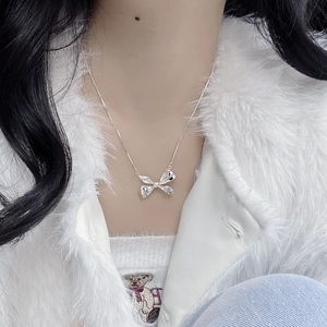 Elegant S925 sterling silver bow pendant necklace with sleek snake chain for women