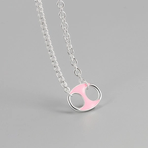 925 silver necklace featuring a pink enamel pig nose pendant on a grey background