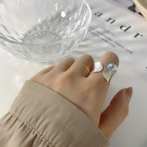 Irregular liquid style 925 sterling silver open ring with a polished organic design