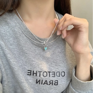 Detail of S925 silver chain with Tiffany blue heart pendant and vintage OT toggle clasp