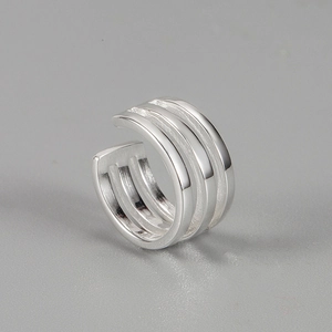 Minimalist 925 sterling silver triple-line ear cuff with polished metallic finish