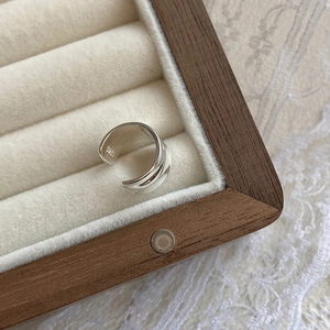 Close-up of S925 sterling silver cuff earring showing the authentic hallmark engraving