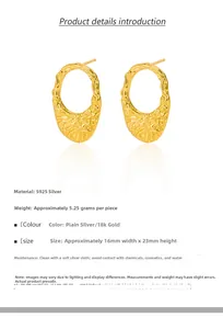 Detail of gold oval earrings with lava texture, 16x23mm size in 925 sterling silver