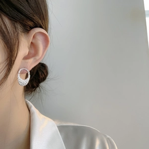 Minimalist 925 sterling silver oval hollow stud earrings with textured lava pattern finish