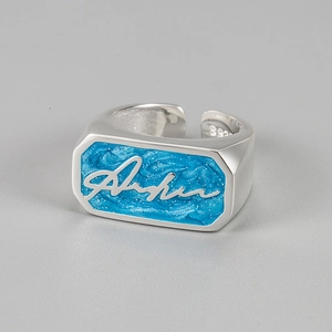 S925 sterling silver open ring featuring blue enamel and cursive Aloha design