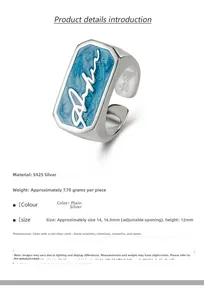 Macro shot of S925 sterling silver ring with blue enamel and white cursive script lettering