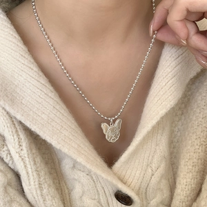 Close-up of S925 sterling silver French Bulldog pendant on a ball chain necklace