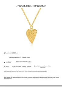 Detailed view of S925 silver heart necklace showing irregular texture and Amour engraving