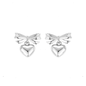 Polished S925 sterling silver bowknot heart stud earrings for women on white background