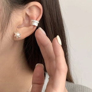 Quilted S925 sterling silver ear cuff set with pearl stud earring on model's ear