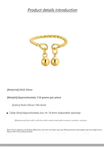 Detail view of adjustable S925 silver twist ring with two spheres and 18k gold plating