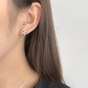 Elegant S925 sterling silver cross mesh stud earrings shown on model for women
