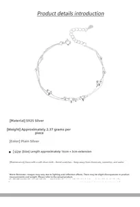 Detail of S925 sterling silver double-layer bracelet with polished beads and heart charms