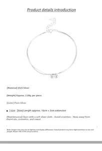 Detail of S925 sterling silver double-layer bracelet with polished bead charms and lobster clasp