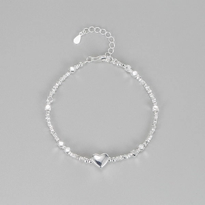 S925 sterling silver heart charm bracelet featuring irregular beads and extension chain