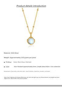 Detail of 925 sterling silver gold-plated necklace with a round moonstone pendant