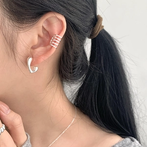 Minimalist S925 sterling silver geometric ear cuff and stud set shown on female ear