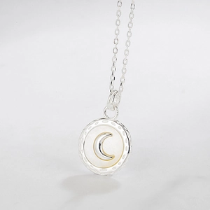 S925 sterling silver moon necklace with white shell pendant in a geometric round design