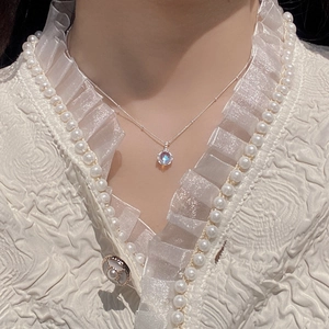 Minimalist S925 sterling silver necklace featuring a round iridescent moonstone pendant