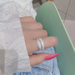 Minimalist S925 sterling silver open ring with unique lava texture on model finger