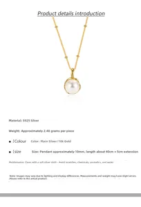 Detail of S925 silver necklace with a white pearl pendant in irregular gold wrapping