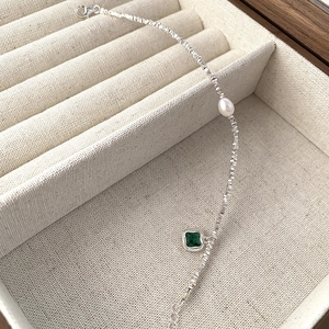 Elegant S925 sterling silver bracelet with white pearl and square green zircon charm