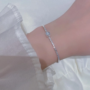 Detailed close-up of S925 sterling silver cube bracelet with authentic hallmark on wrist