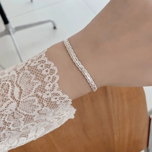 Elegant 925 sterling silver braided twist rope chain bracelet for women on wrist