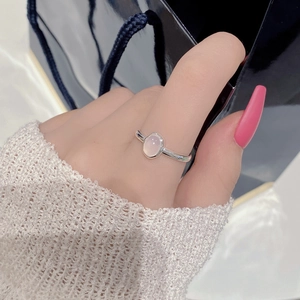 S925 sterling silver ring featuring an oval pink opal stone with adjustable band design