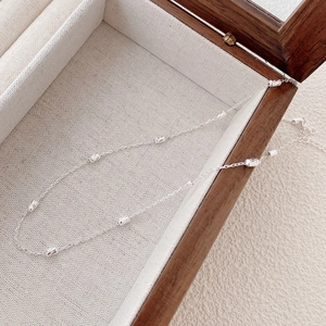 Minimalist S925 sterling silver beaded necklace featuring fine laser-carved rice grains