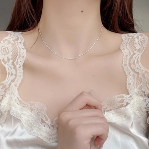 925 sterling silver chain necklace with shimmering textured facets on female model
