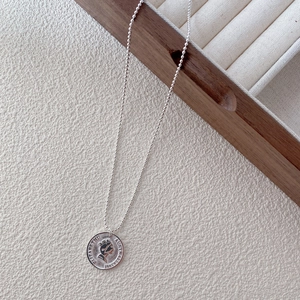 Vintage 925 sterling silver coin necklace featuring Elizabeth II relief on bead chain