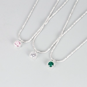 Close-up of S925 silver handbag necklaces with pink, white and green square zircon pendants