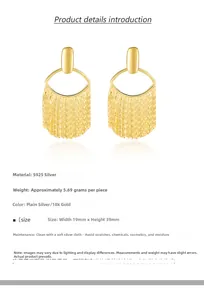 Close-up of S925 silver 18K gold tassel earrings with geometric discs and chain fringe