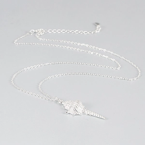 Detail of S925 sterling silver conch shell pendant on a fine adjustable chain necklace