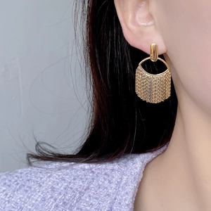 Elegant gold-plated tassel drop earrings with sleek metallic chains for a minimalist look