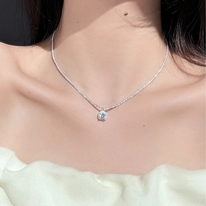 Elegant S925 sterling silver square bag necklace with cubic zirconia on a model