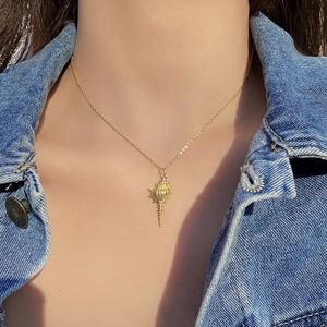 Minimalist S925 sterling silver conch pendant necklace on a model with denim jacket