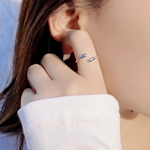 Minimalist S925 sterling silver water drop open ring on a female model's hand