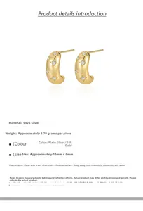 Detail of S925 silver C-shape gold earrings with embossed star pattern and white zircon