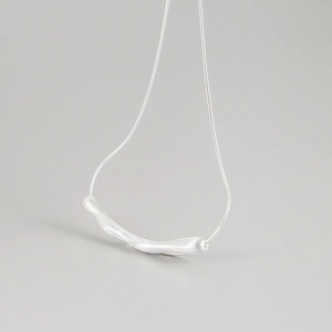 Detailed view of 925 sterling silver brushed bar pendant on a sleek snake chain necklace