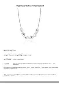 Détail macro du collier en argent S925 montrant des breloques ovales de 5x8mm