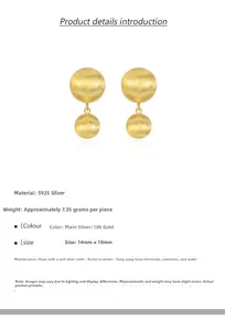 Detail of S925 silver double ball earrings with 18k gold brushed matte finish