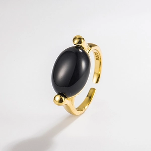 Close-up of S925 sterling silver ring featuring a polished oval black onyx gemstone