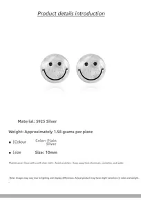 Macro shot of 925 sterling silver smile earrings with brushed finish and black oil detail