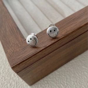 Minimalist 925 sterling silver smiley face stud earrings with matte brushed finish texture