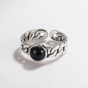 Close-up of S925 sterling silver hallmark on adjustable cross line black onyx ring