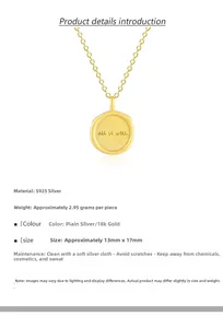 Close-up of S925 sterling silver coin necklace with all is well engraving and 18k gold plating