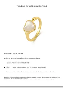 Detail view of heart-shaped white shell ring with S925 silver and 18K gold plating